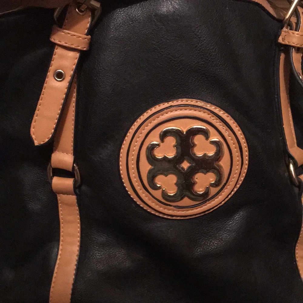 A purse that has been worn only one time!